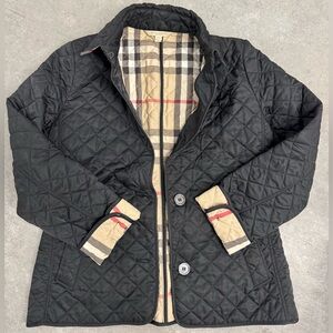 Burberry Black Quilted Jacket with original Check Lining. Like new
